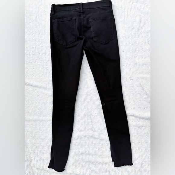FRAME Le Skinny de Jeanne Mid-Rise Raw-Edge Step Hem Jeans - Picture 3 of 11